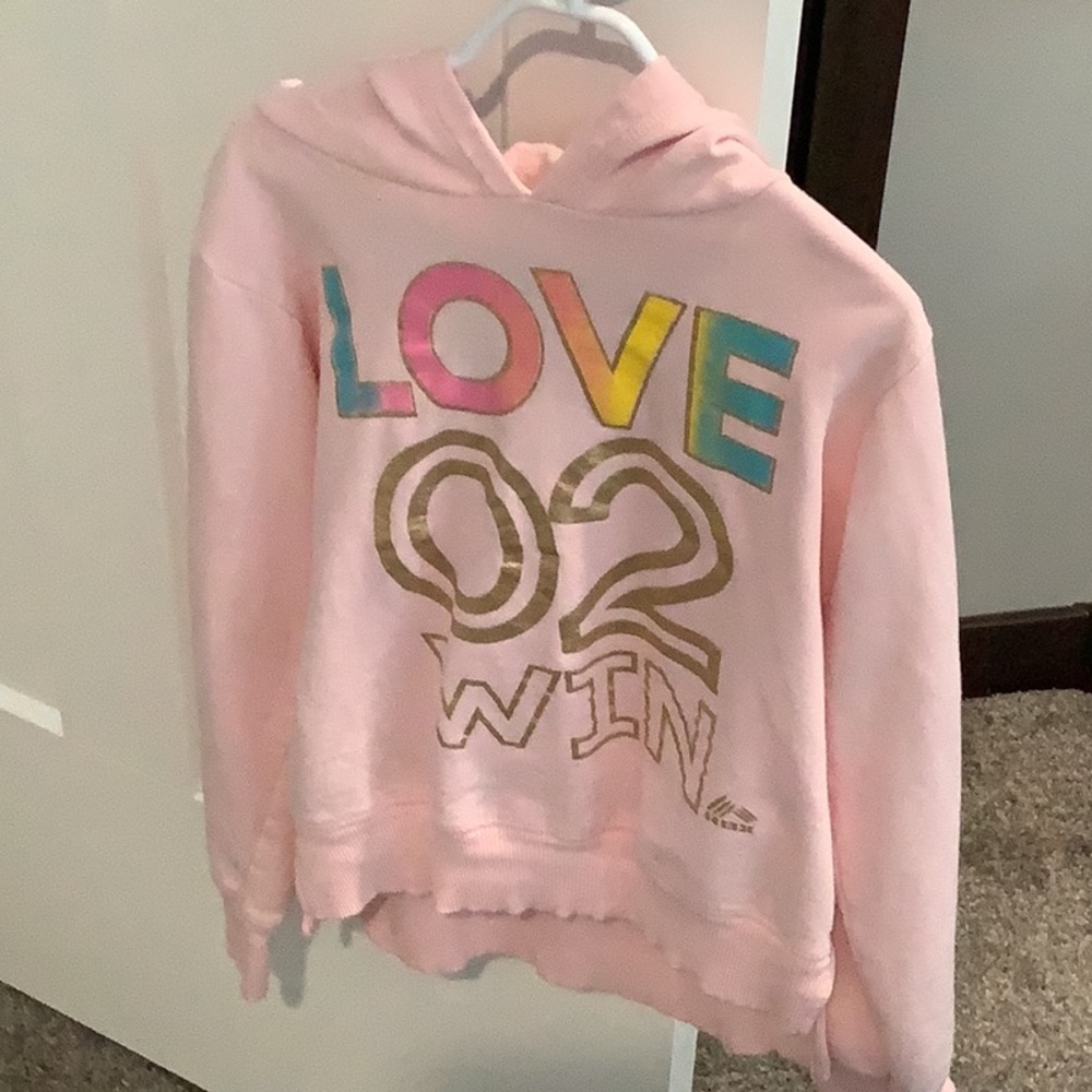 This is a pink sweatshirt